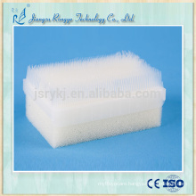 Disposable sponge surgical scrub brush with nail cleaner